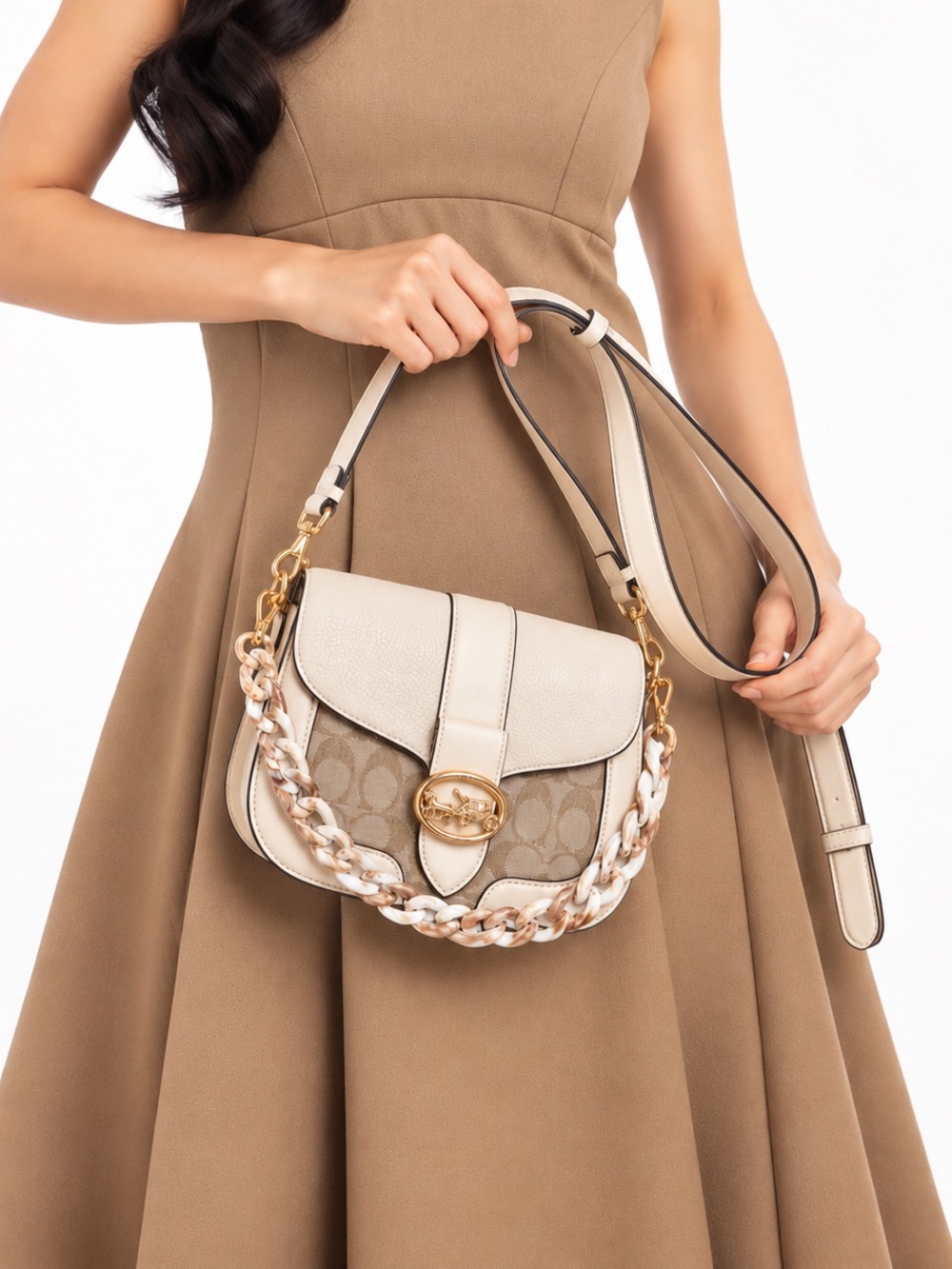 Coach Georgie Saddle Bag In chalk off white leather and chain charm